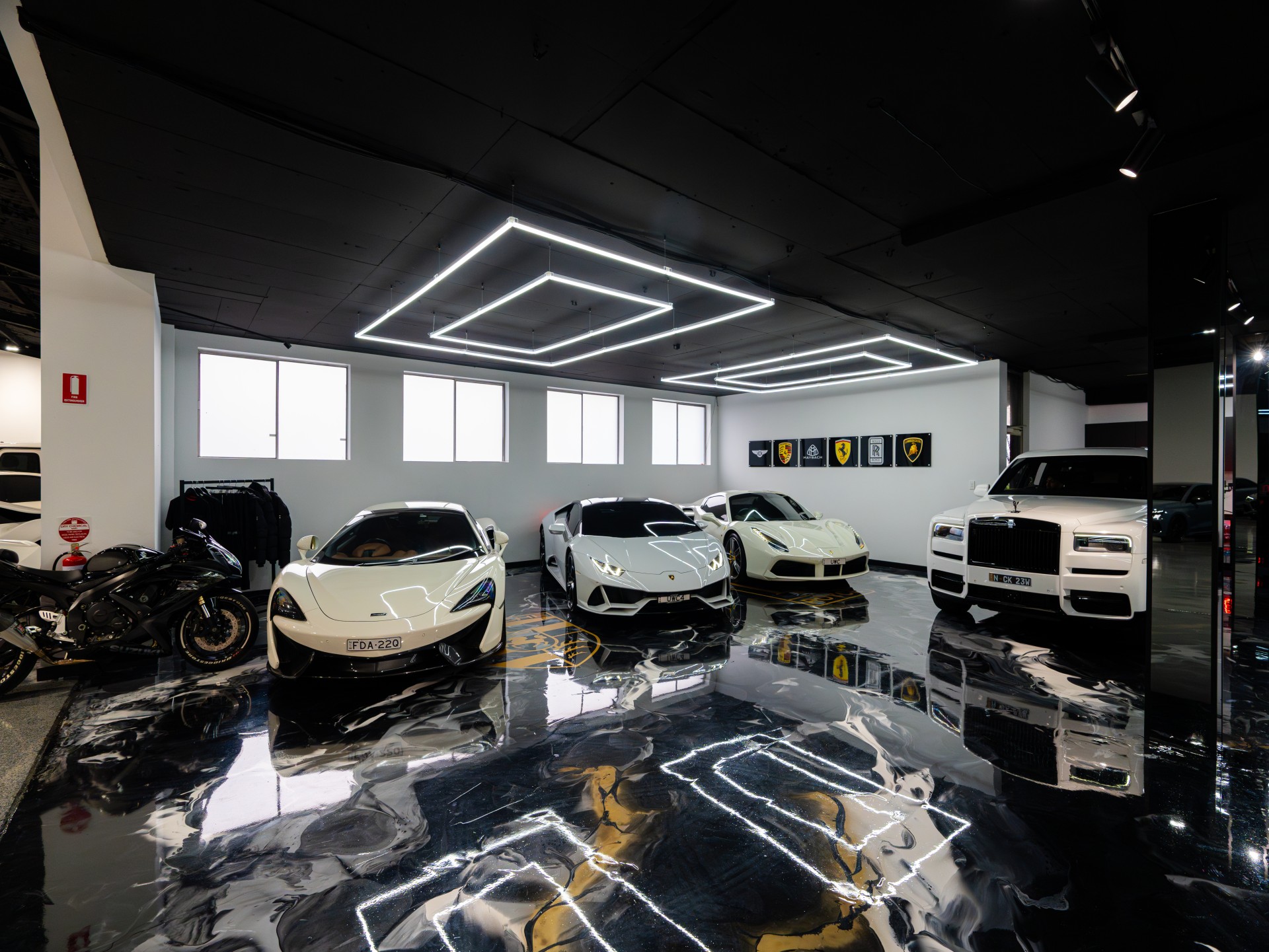 Luxury car profile in a modern studio with dramatic lighting